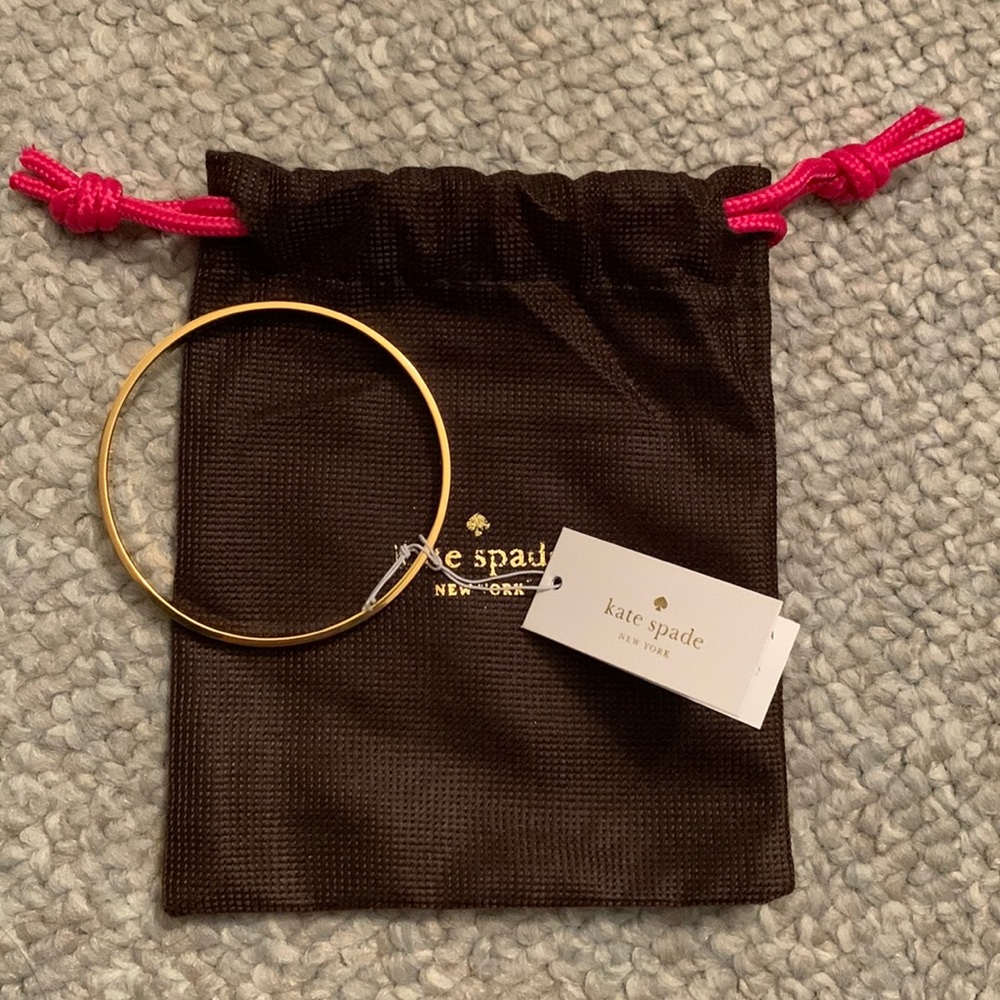 Brand new (NWT) Kate Spade New York Gold Bangle, slim, stackable. Heart of gold
